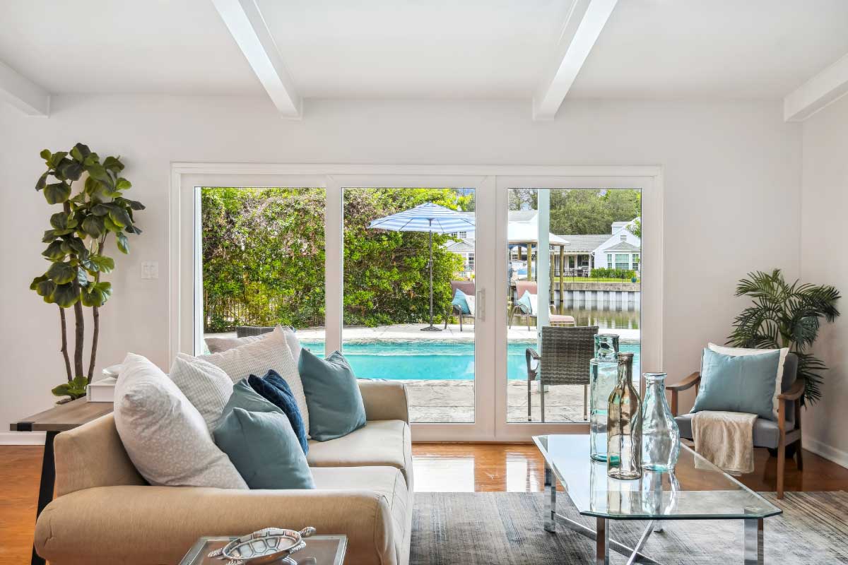 Real Estate Photography living room with pool view